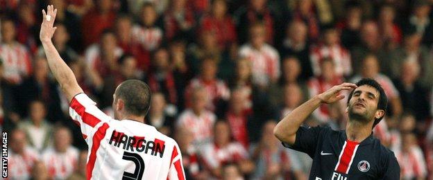 Derry City's Kenny Shiels and Paris Saint-Germain's Pierre-Alain Frau during the Uefa Cup tie in 2006