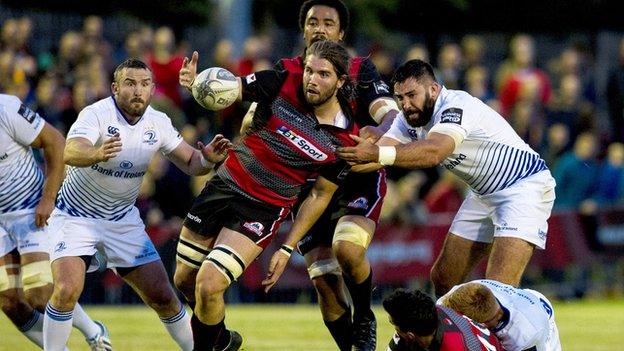 Edinburgh's Ben Toolin (2nd from left) is pulled back by Jamie Hagan