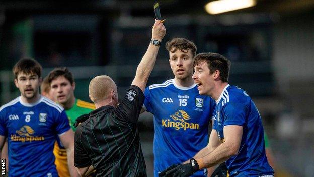 Cavan protest after Killian Brady is black carded by referee Barry Cassidy