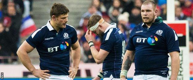 Scotland's Ross Ford, Finn Russell and Gordon Reid are left disappointed in Paris