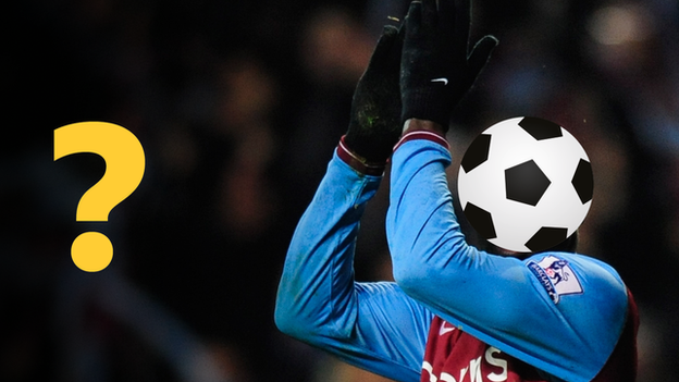 Player hidden by a football