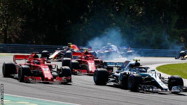 Valtteri Bottas fends of Kimi Raikkonen and Sebastian Vettel