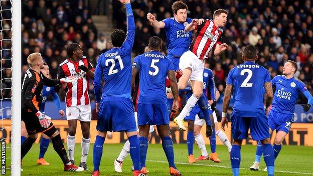 A scramble in the Leicester goalmouth