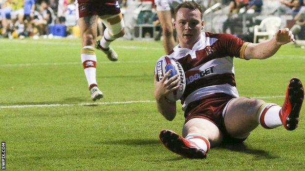 Liam Marshall scores a try for Wigan