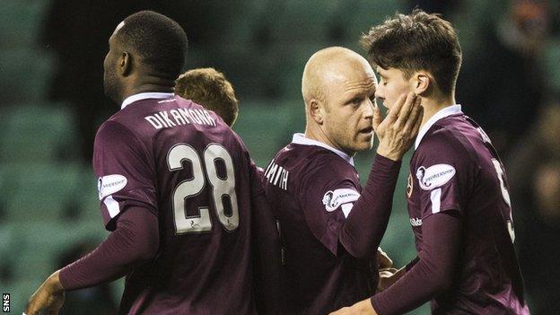 Hearts captain Steven Naismith, centre, will take a 50% wage cut