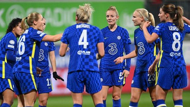 Chelsea players talk after going 2-0 down against Wolfsburg