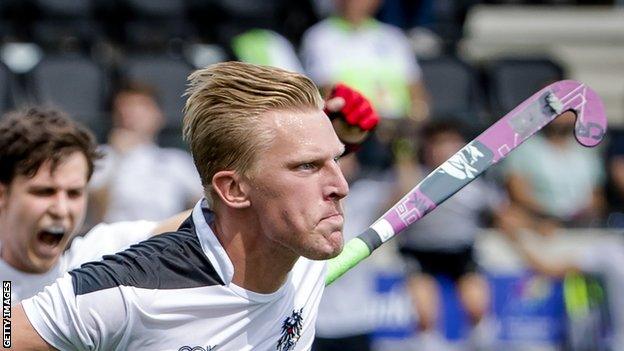 Michael Korper celebrates for Austria