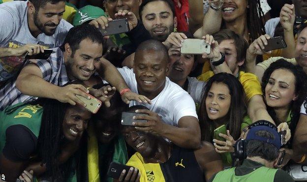 Usain Bolt taking selfies after the Rio 2016 100m final