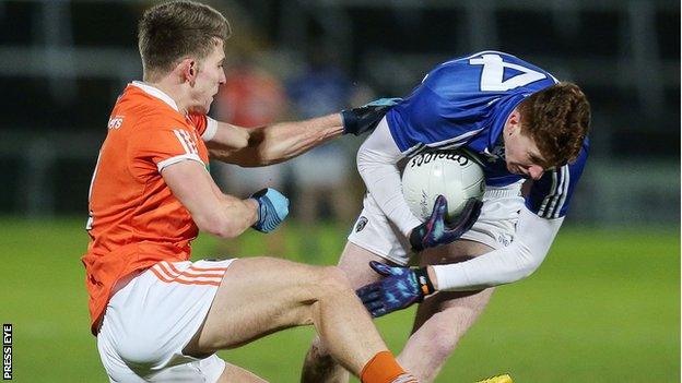 Armagh's Shea Heffron challenges Evan O'Carroll of Laois