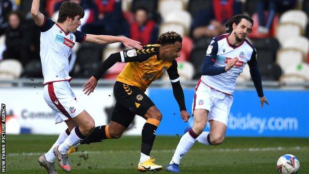 Newport's Nicky Maynard is tackled by Jordan Williams