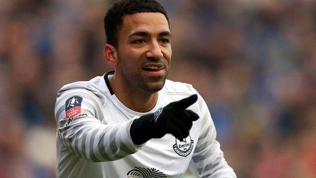 Aaron Lennon celebrates his goal