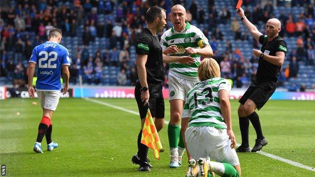 Rangers' Jordan Jones is sent off for his tackle on Celtic's Moritz Bauer