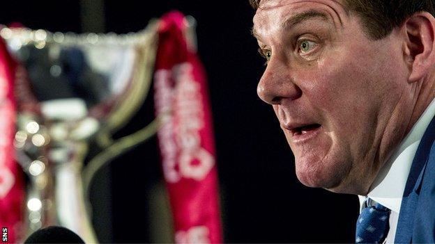 St Johnstone boss Tommy Wright speaks to the media at Hampden Park, flanked by the League Cup