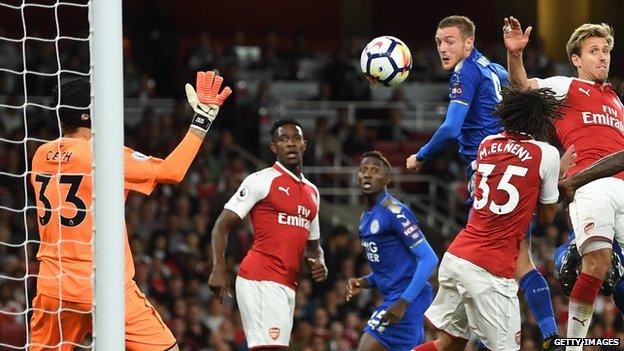 Jamie Vardy heads Leicester in front against Arsenal