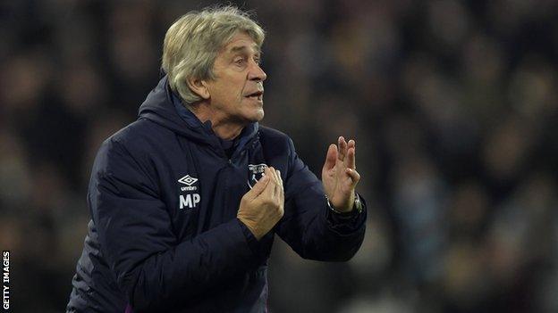 West Ham boss Manuel Pellegrini directs his players during a Premier League match