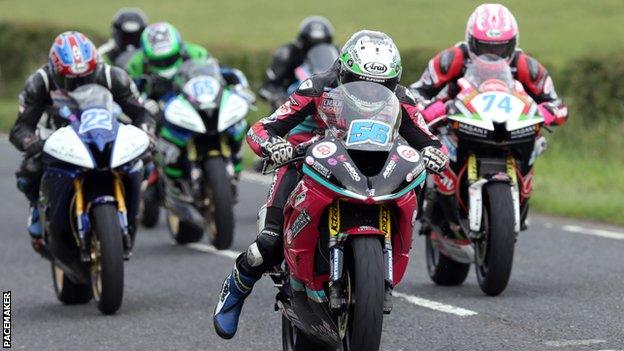 Adam McLean leads the field off the line for a Supersport race at Armoy