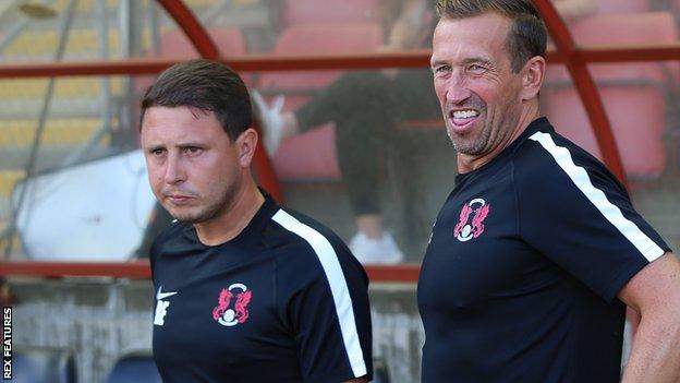 Ross Embleton and Justin Edinburgh on the sidelines at Leyton Orient