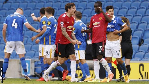 Victor Lindelof and Eric Bailly celebrate