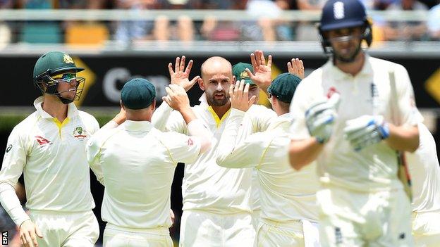 Australia's Nathan Lyon celebrates the wicket of Chris Woakes