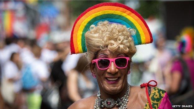 Members of the Lesbian, Gay, Bisexual and Transgender (LGBT) community take part in the Pride Parade in London