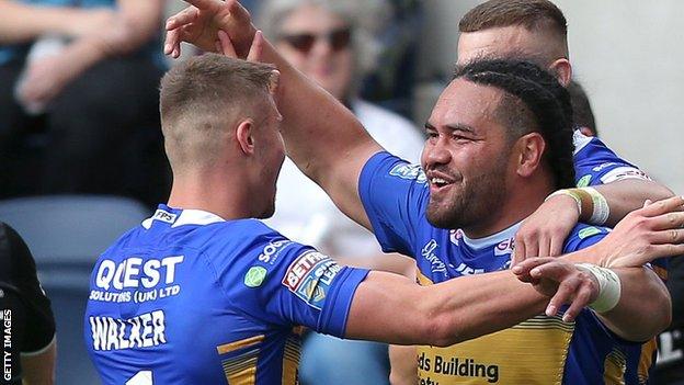 Konrad Hurrell celebrates his try for Leeds