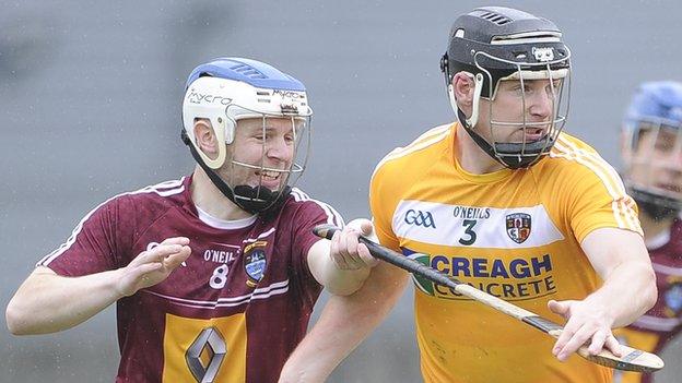 Antrim's Neal McAuley battles with Westmeath's Cormac Boyle in this year's Leinster Championship encounter