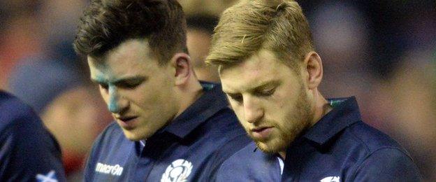 Scotland's Matt Scott and Finn Russell look dejected after their loss to England on Saturday