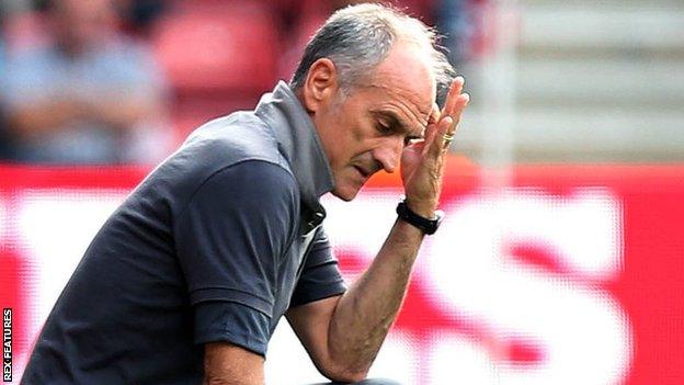 Francesco Guidolin averts his gaze during Swansea's defeat at Southampton