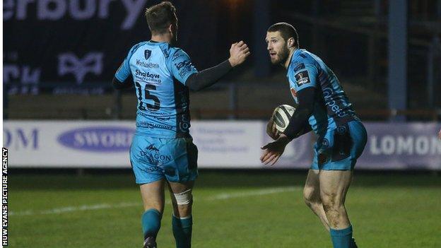 Jonah Holmes is congratulated by Josh Lewis after his second try