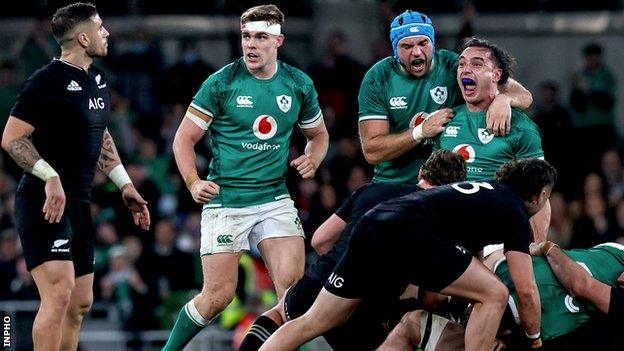 Ireland's James Lowe celebrates a crucial turnover against New Zealand