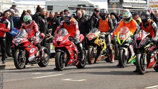 Riders on the start-line for the first practice session at the North West 200