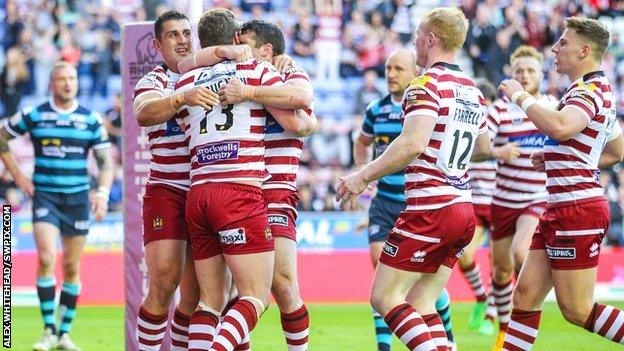 Wigan celebrate skipper Sean O'Loughlin's first-half try