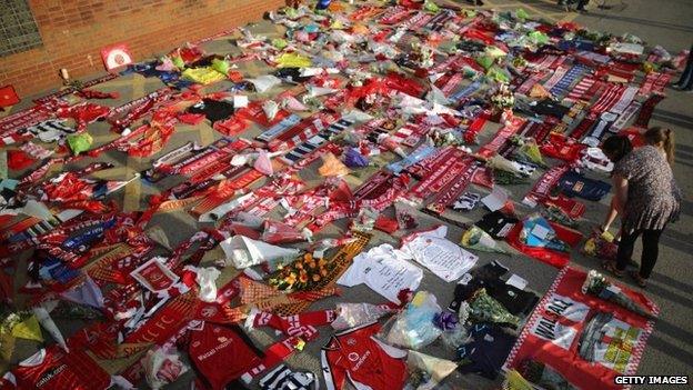 Tribute scarves and shirts outside Walsall FC ground