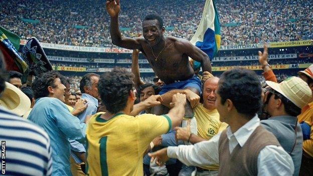 Pele is held aloft at the Estadio Azteca, after winning the 1970 World Cup.