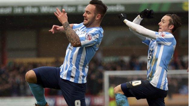 Coventry top scorer Adam Armstrong celebrated the first of his matchwinning treble with team-mate James Maddison