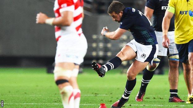 Greig Laidlaw kicks a penalty for Scotland