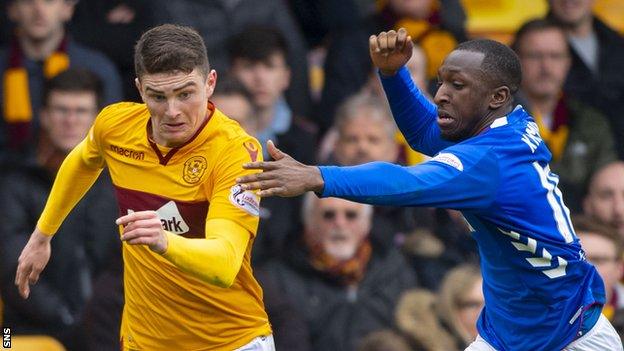 Motherwell's Jake Hastie skips away from Rangers' Glen Kamara