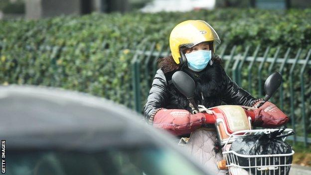 Wuhan resident in mask