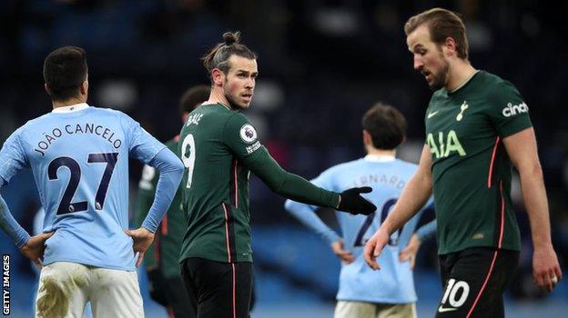 Gareth Bale talks to his Tottenham team-mate Harry Kane during Saturday's defeat by Manchester City