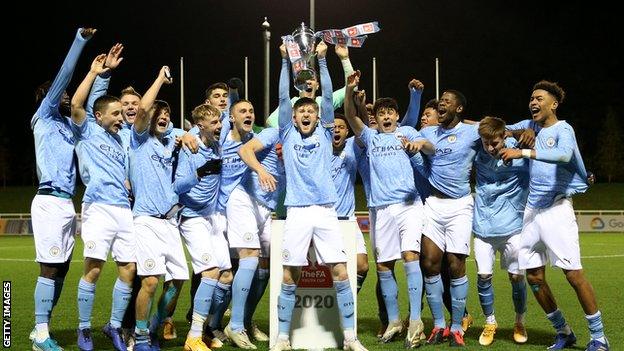 Manchester City players lift the FA Youth Cup