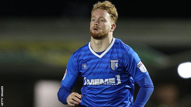 Connor Ogilvie in action for Gillingham