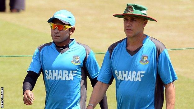 Then Bangladesh cricket captain Mushfiqur Rahim (left) and coach Richard Pybus arrive during a training session in Sri Lanka in 2012