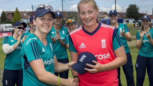 Heather Knight presents Sophie Ecclestone with her cap before the 1st Natwest International T20 played between England Women and Pakistan Women at The County Ground on July 3, 2016 in Bristol, England.