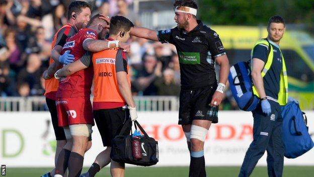 Glasgow's Ryan Wilson consoles John Barclay as he is helped off during Scarlets' Pro14 semi-final win