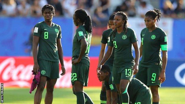 Nigeria players following defeat by Germany