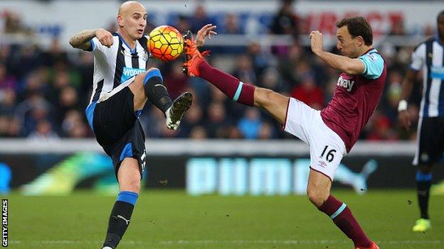 Newcastle United midfielder Jonjo Shelvey (left) in action against West Ham United