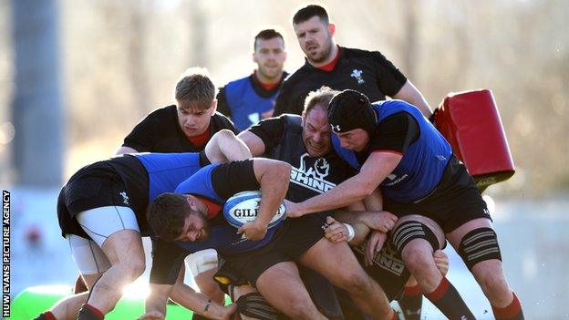 Wales players battle for the ball in training