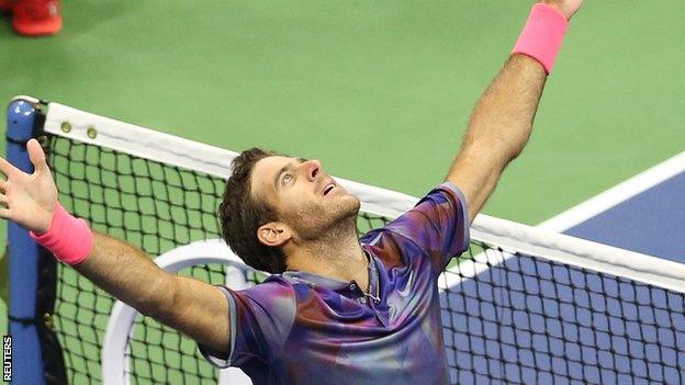 Juan Martin del Potro celebrates beating Roger Federer