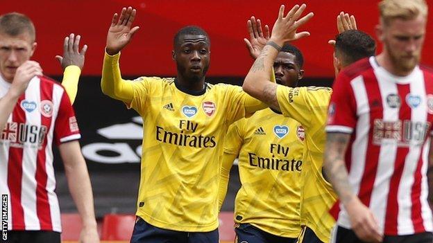 Nicolas Pepe (centre) celebrates with Arsenal team-mates