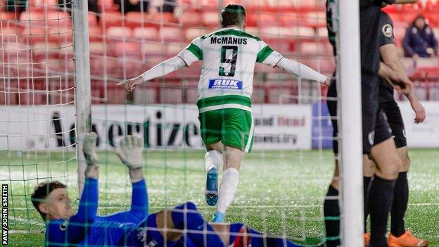 Saints' Declan McManus celebrates after scoring against Nomads